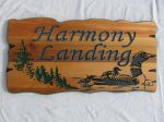 Wood sign loons trees